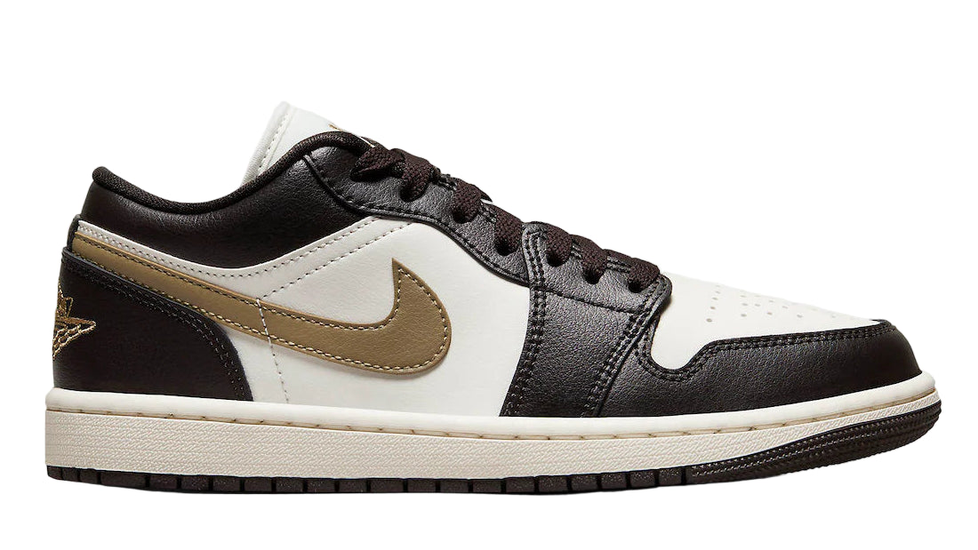 Black and white sneaker with gold accents on a white background