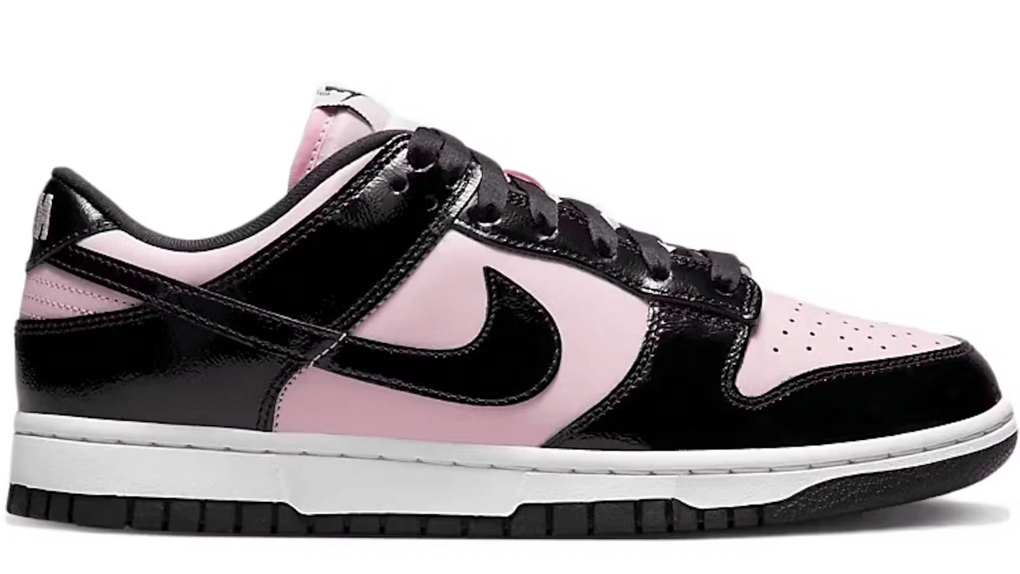 Pink and black Nike sneaker on a white background