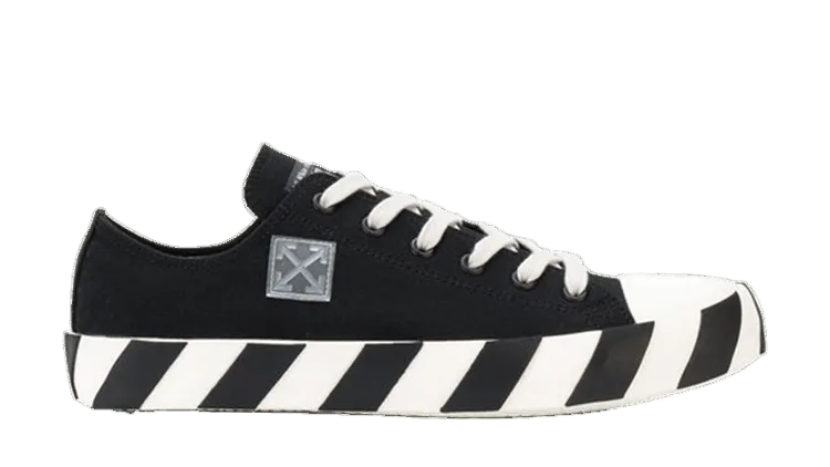 Black sneaker with white stripes on a transparent background