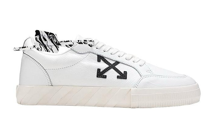 White sneaker with black accents on a white background
