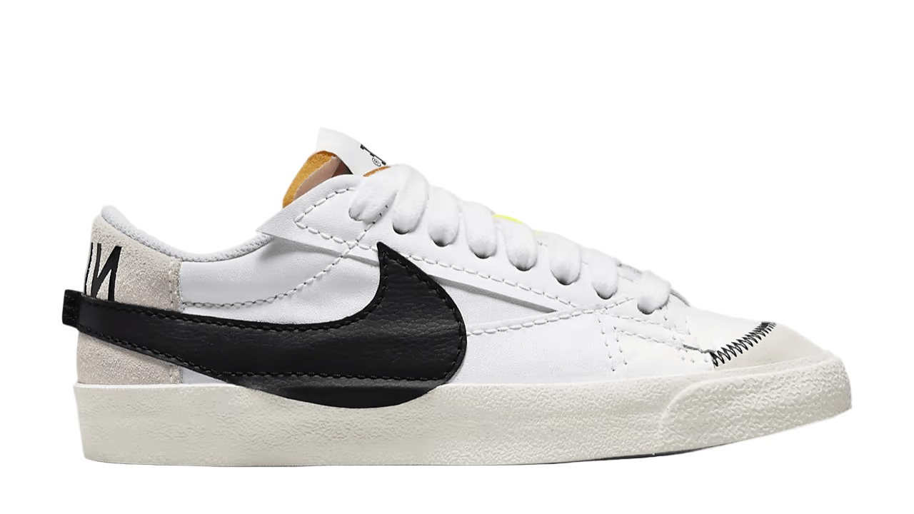 White sneaker with black swoosh logo on a white background