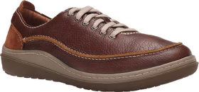 Brown leather shoe with white laces on a white background
