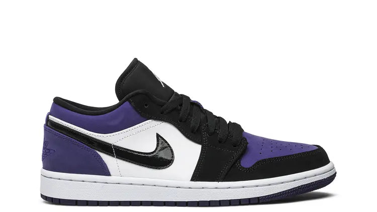 Purple, black, and white sneaker on a white background