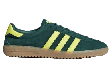 Green Adidas sneaker with yellow stripes on a white background