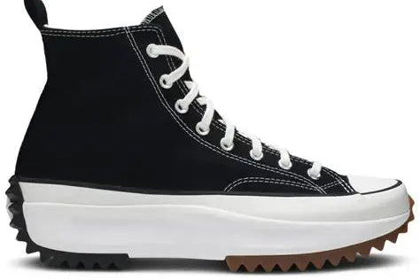 Black high-top sneaker with white laces on a white background