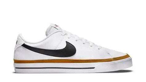 White sneaker with black swoosh logo on a white background