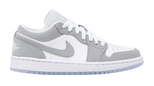 Gray and white sneaker with Nike logo on a white background