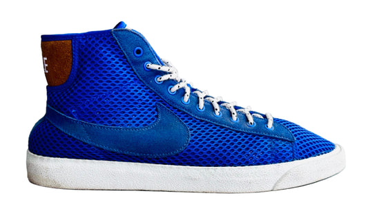 Blue sneaker with a white sole