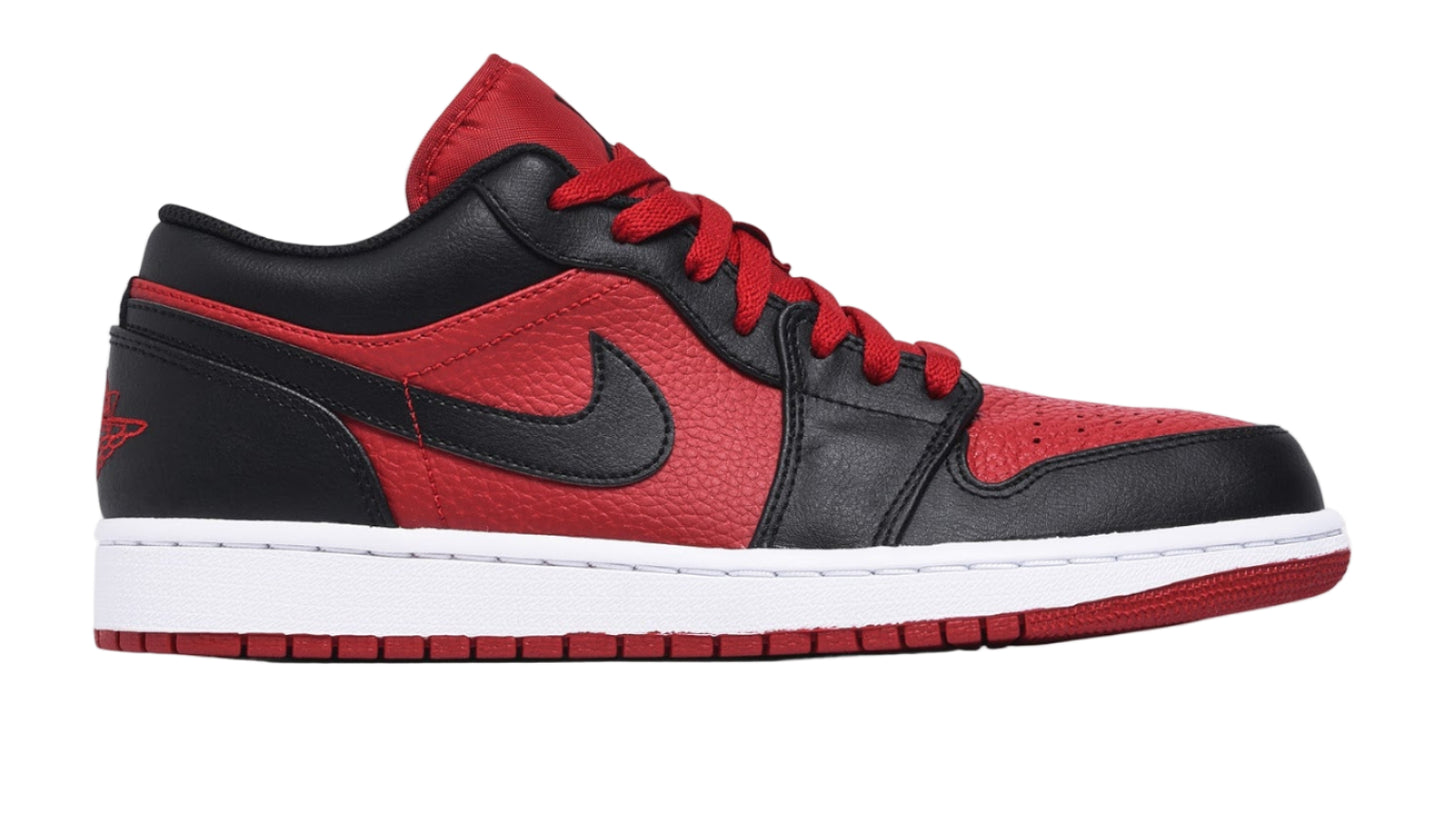 Black and red sneaker with a prominent Nike logo on a white background